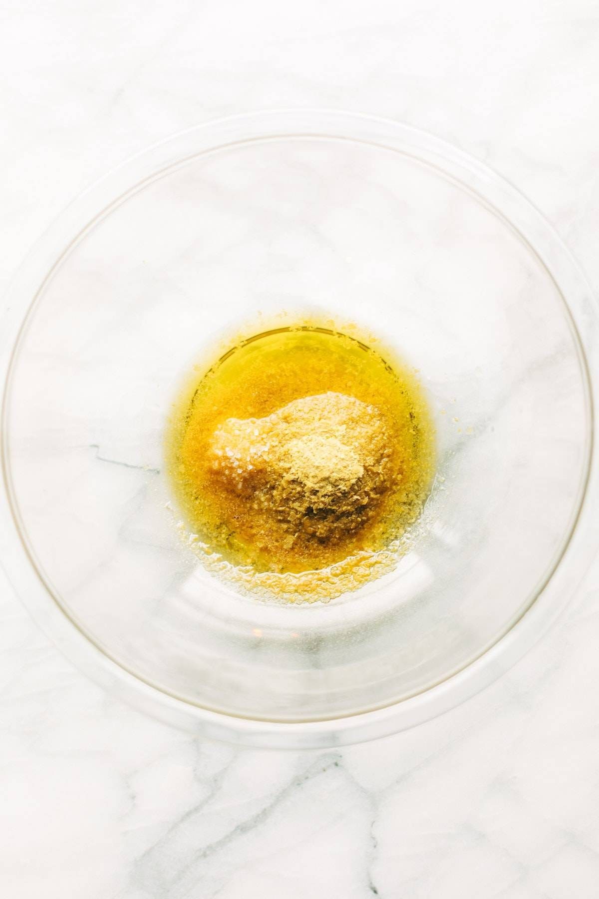 Ingredients for Cheezy Garlic Croutons in a bowl.